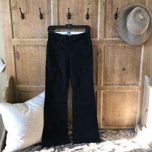 Worn once black pinstripe trouser.